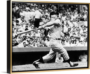Mickey Mantle of the New York Yankees, hitting his 49th home run of the season