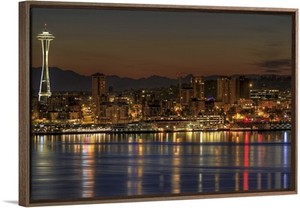 Seattle skyline with Space Needle on Puget Sound from Alki Beach at Dawn.