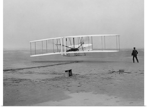 The first flight of the Wright Flyer in 1903