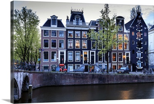 Old gabled houses line the Keizersgracht canal at dusk, Amsterdam, Netherlands