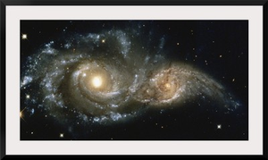 These two spiral galaxies were seen near the constellation Canis Major.