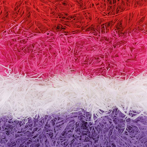 Rood, roze en paars versnipperd vloeipapier 