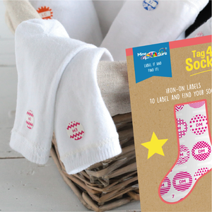 Personalised iron-on labels for socks. The end to lost or swapped socks. For the whole family (1 to 6 people). Small, round each with a different desi