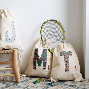 Personalised Initial rucksack, organic cotton, customised with a name and initial, to take everywhere: at school, afterschool club, sports....