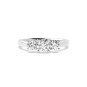 Graduating Round Diamond Trilogy Engagement Rings in