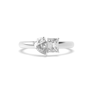 prong setting emerald and pear shape two stone ring