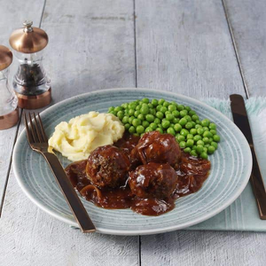 Faggots in Gravy with Mash & Peas