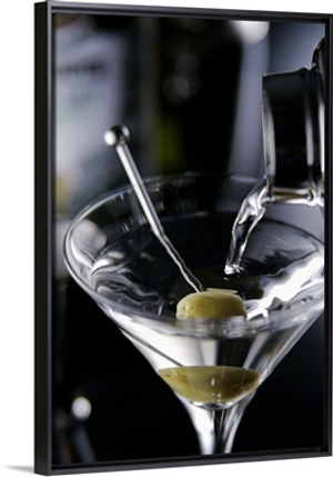 Cocktail pouring into glass