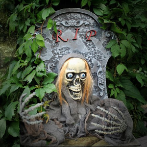 Tombstone With Moving Laughing Reaper