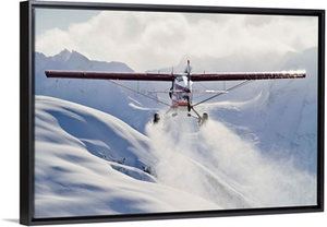 View of a Super Cub air taxi at Tanaina Glacier in the Neacola Mountains, Alaska