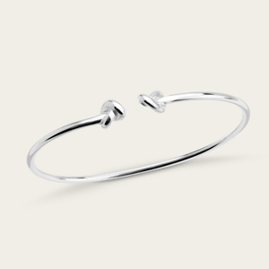 Portrait Muse Silver Knot Torque Bangle
