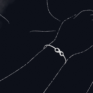 Portrait Muse Silver Infinity Bangle