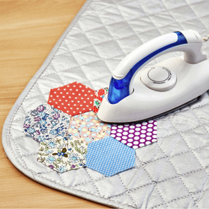 Tapis de repassage matelassé