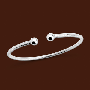 Portrait Series 1 Silver Patterned Torque Bangle