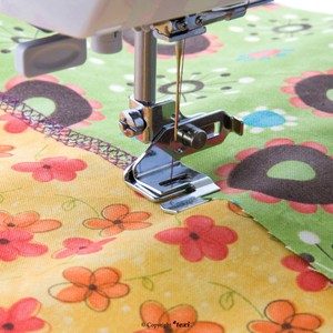 Outil pour couture bord à bord