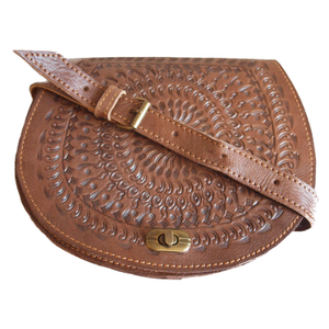 The Temara Embossed Saddle Bag In Brown