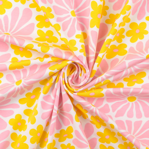 Tissu jersey fantaisie - Fleurs sixties jaunes et roses