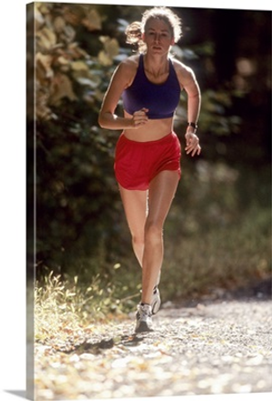 Female runner out on the trails