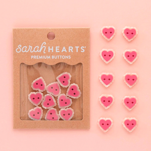 Boutons petits coeurs 2 trous - Rose 15 mm