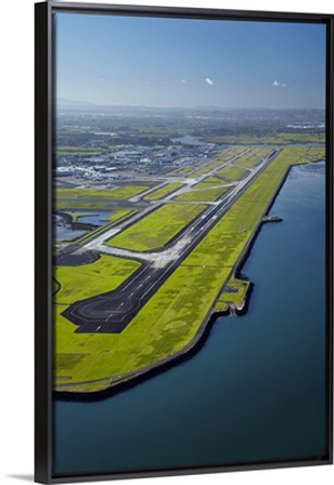Runway at Auckland Airport, and Manukau Harbour, North Island, New Zealand