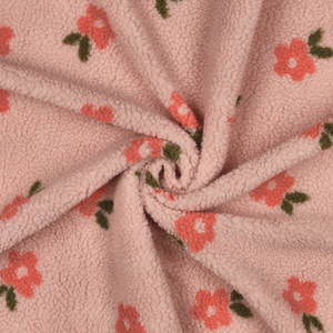 Tissu fourrure Teddy - Fleurs corail fond rose